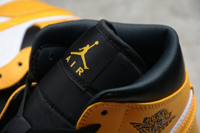 jordan 1 mid university gold 554724-170